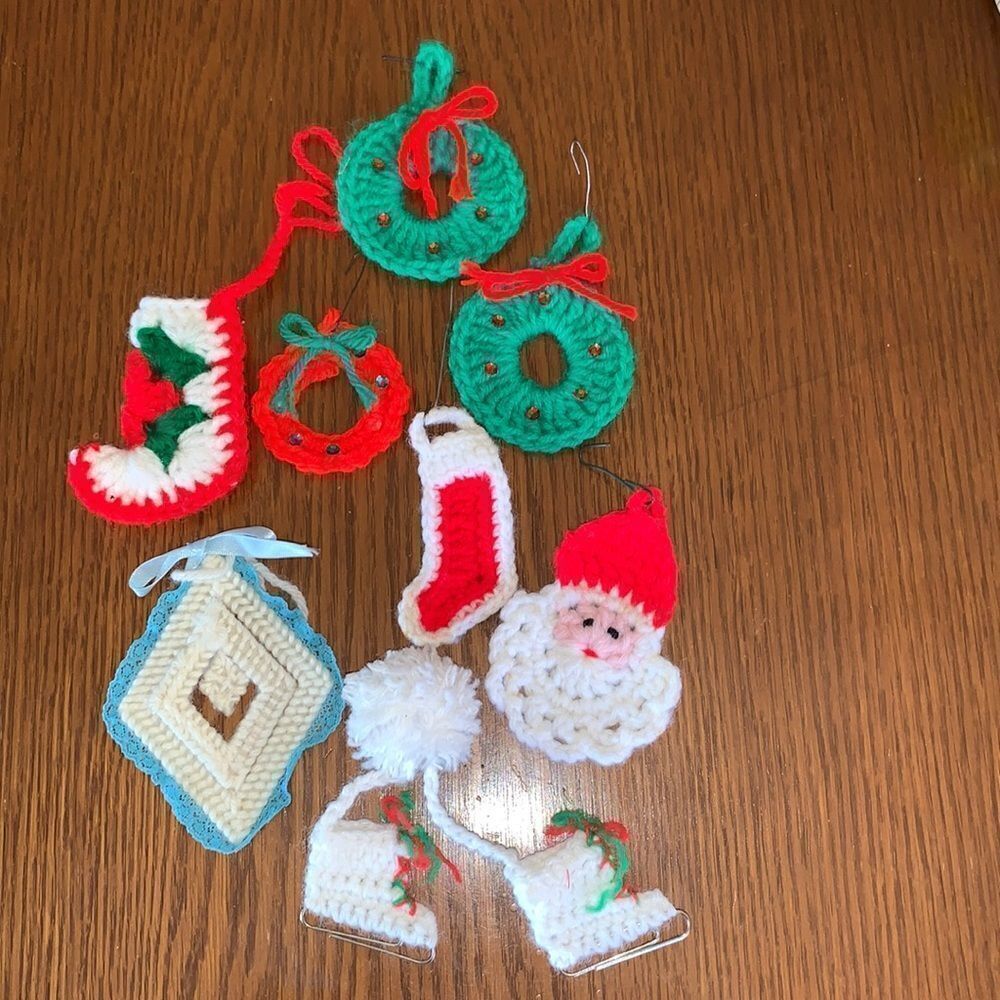 Collection of kitschy handmade yarn Christmas tree ornaments